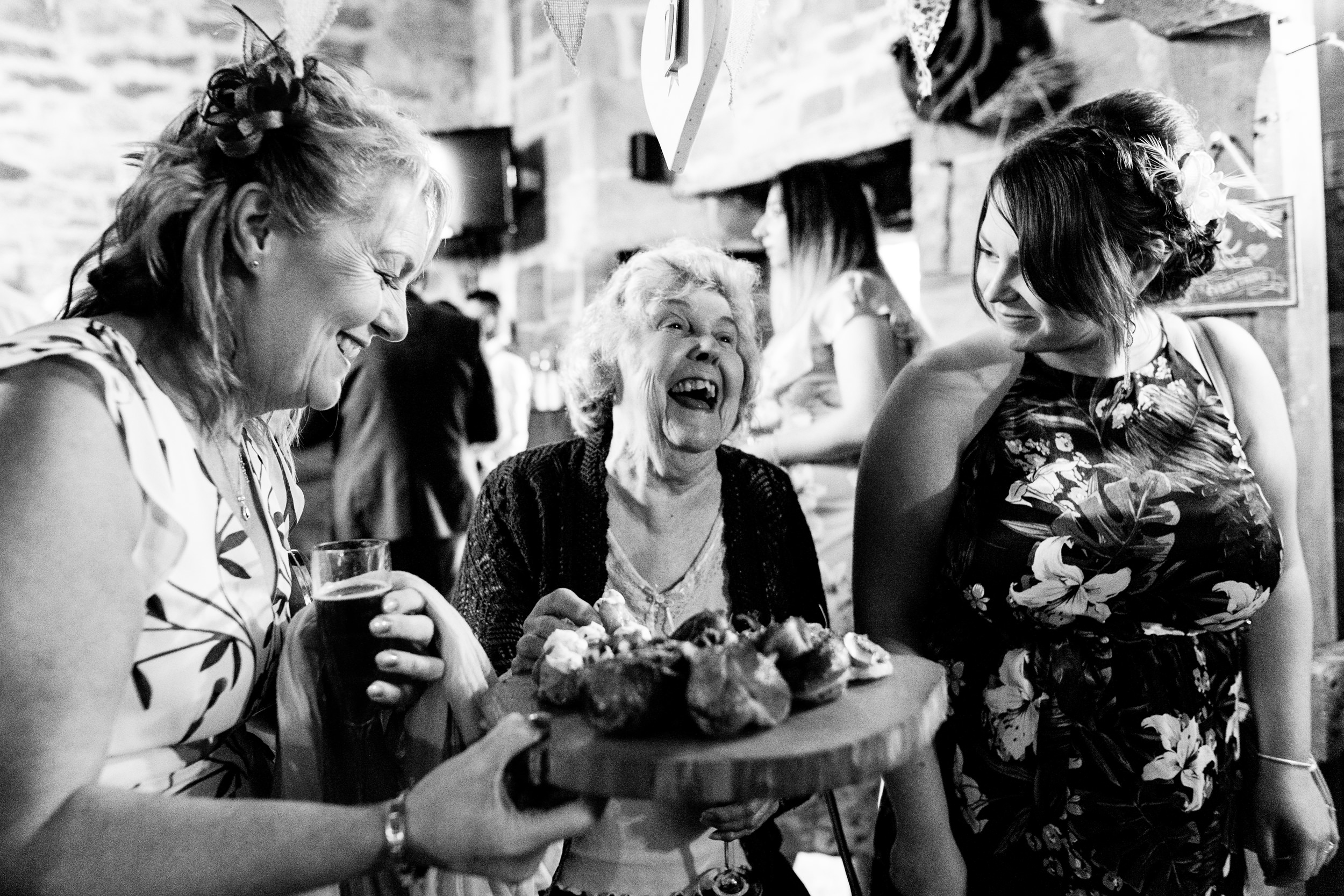 guests enjoying canapes. esk valley wedding photography by emma and rich.