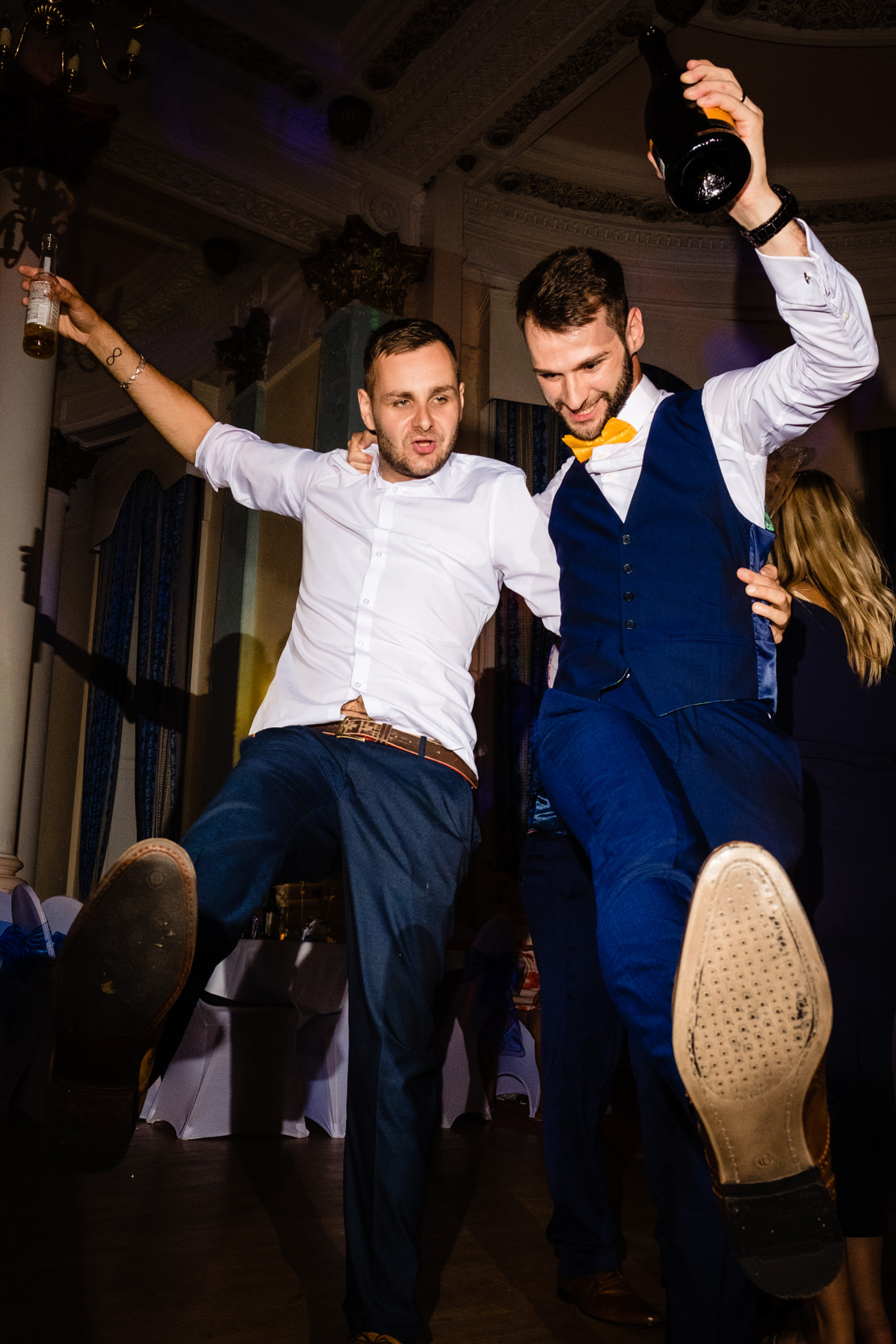 groom dancing with groomsman. grand hotel scarborough wedding photography by emma and rich.